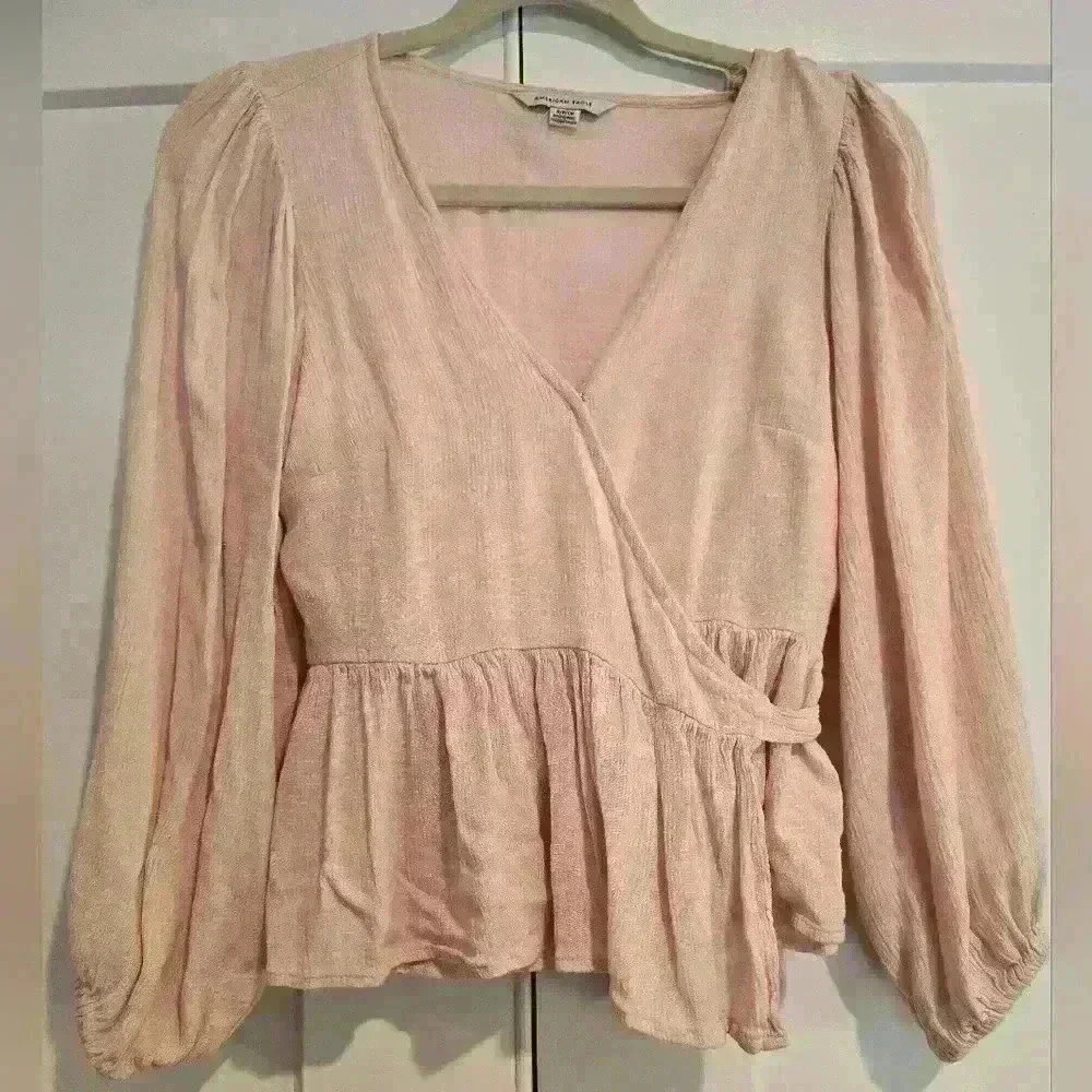 Light Pink Wrap Peplum Blouse